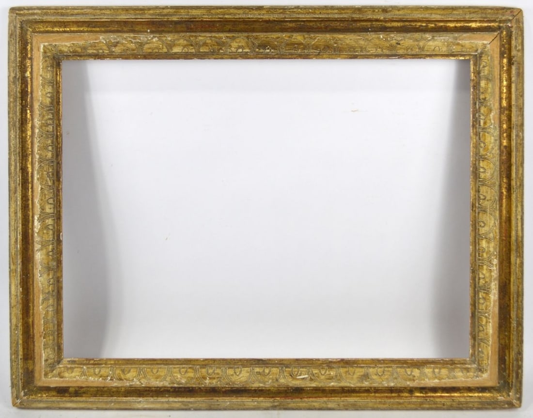 VENETIAN GILTWOOD & SCRAFFITO FRAME: A Heydenryk Venetian frame with an incised / scraffito design. Measures: 32 1/2" x 26 3/4" Rabbet: 26 1/4" x 20 1/2"