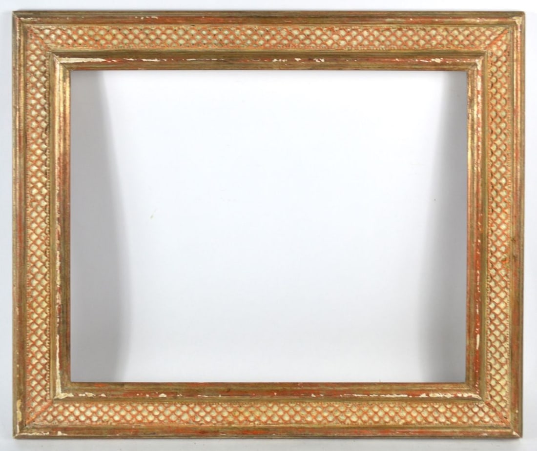CARVED & GILTWOOD HEYDENRYK MODERNIST FRAME: An exquisite honeycomb carved and gilt frame from the House of Heydenryk. A delightful and beautiful frame. Measures: 25 1/2" x 21 1/2" Rabbet: 20 1/4" x 16 1/4"