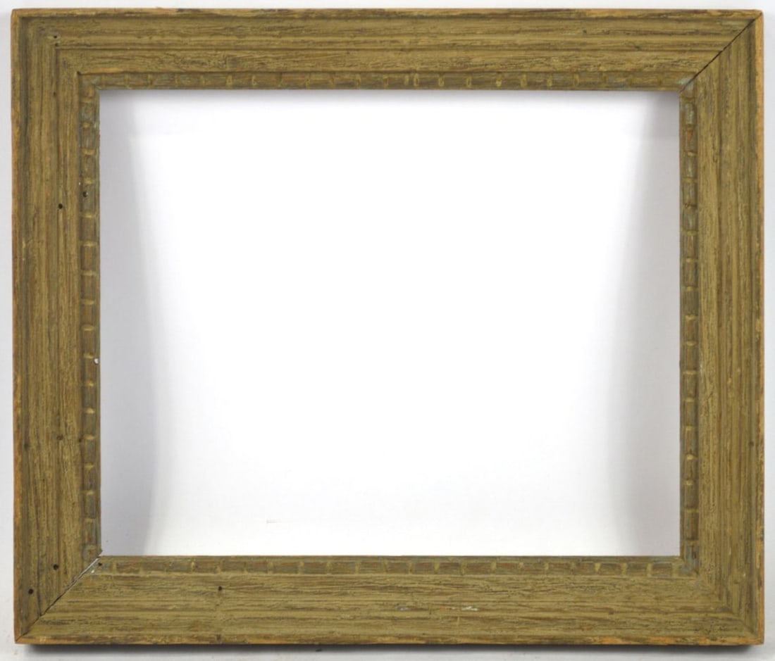 HOUSE OF HEYDENRYK WORMY CHESTNUT MODERNIST FRAME: A classic Heydenryk American modernist frame design in carved wormy chestnut. Parcel silver gilt accents to the inner dental molding carved detail. Measures: 16" x 13 1/2" Rabbet: 13" x 10 3/4"