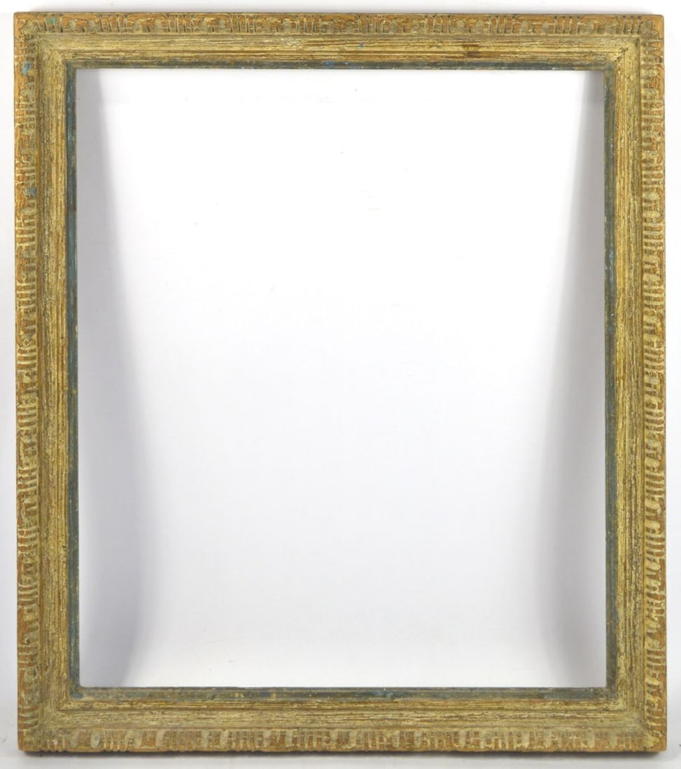 FINELY CARVED ITALIAN MODERNIST FRAME: A finely carved Italian modernist frame from Heydenryk. Applied gesso scumbling with parcel gilt remnants to the inner strip and carving with blue applied to the inner edge. An appealing frame.