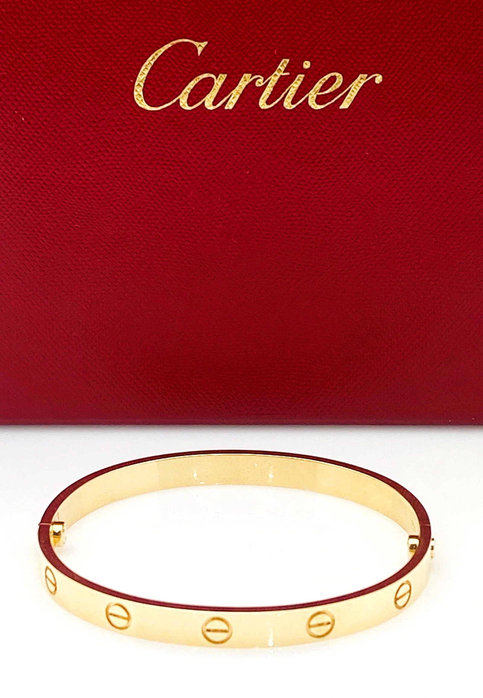 CARTIER 18K YELLOW GOLD LOVE BRACELET SIZE 19: CARTIER 18K YELLOW GOLD LOVE BRACELET SIZE 19 BRAND: CARTIER:COLLECTION: LOVE :STONES: NO STONES:SIZE: 19