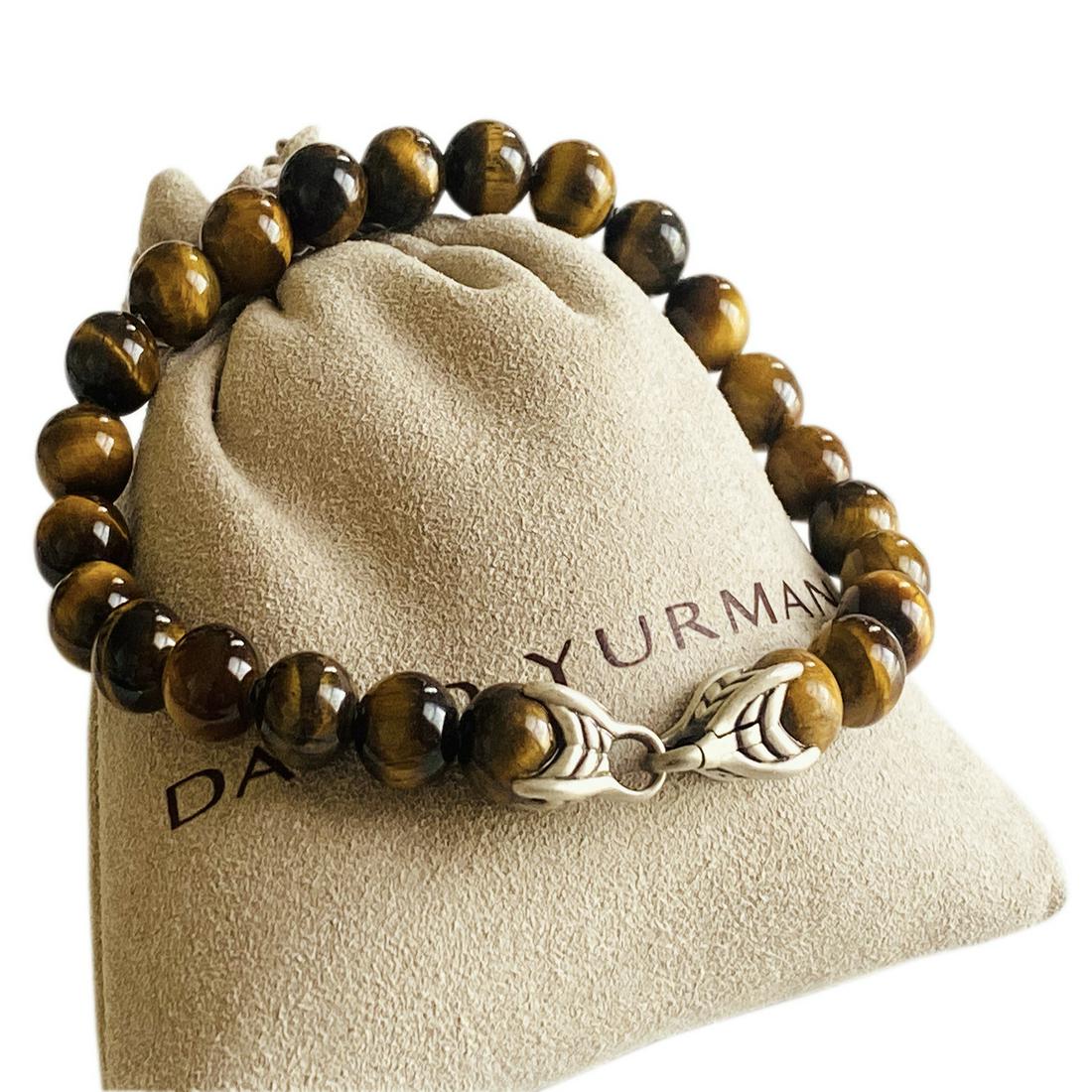 DAVID YURMAN SPIRITUAL BEADS BRACELET TIGER: DAVID YURMAN SPIRITUAL BEADS BRACELET WITH TIGER'S EYE , 8mm-BRAND: DAVID YURMAN-COLLECTION: SPIRITUAL BEADS -STONES: TIGER'S EYE-METAL : STERLING SILVER 925-WIDTH : 8mm BEADS-SIZE: 8.5"-CONDITION: EX