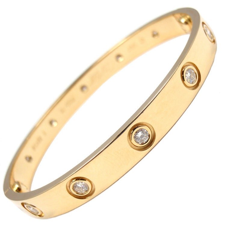 Cartier Yellow Gold 10 Diamond Love Bracelet Size 16: Cartier LOVE Yellow Gold 10 Diamonds Bracelet Size 16 Metal: 18k Yellow Gold Diamond: 0.96tcw brilliant cut diamonds Size: 16 Excellent condition. Comes with Cartier Box