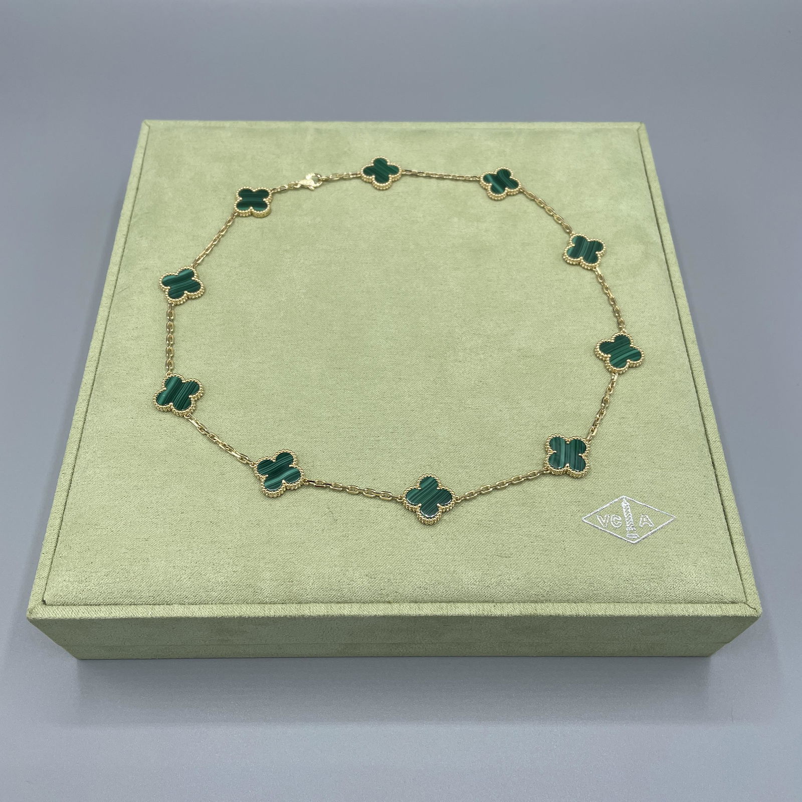 Van Cleef & Arpels Alhambra 10 Motif Necklace: Van Cleef & Arpels Alhambra 10 Motif Necklace Category: Jewelry Subcategory: Necklace Designer: Van Cleef & Arpels Model: Magic Alhambra 10 Motifs Stones: Malachite Necklace length: 16.54 Metal: 18K Y