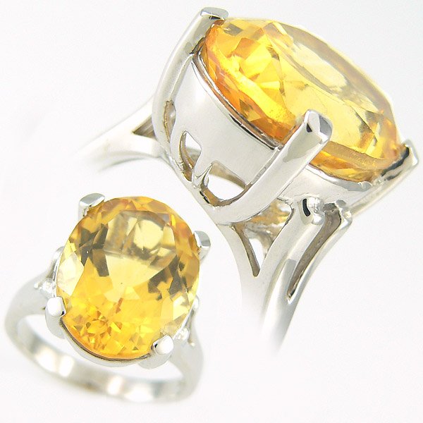 DIAMOND & CITRINE LADIES RING 10.00 CTW 10K: BIG, BOLD & BEAUTIFUL - GENUINE 10.0 CTW CITRINE LADIES RING IN 10K WHITE GOLD GEMSTONE: 1 OVAL CUT CITRINE 10.00 CTW GOLD: 6.50 GRAMS SIZE: 6 1/2 TOP DIMENSIONS: APPROX. 5/8" X 7/16"