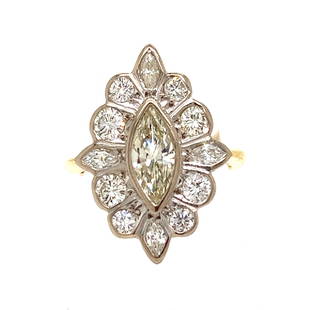 18k Diamond Marquise Ring: 18k Yellow Gold Weight 7.6g Center Diamond Approx 1.25ct VS1 J-L Marquise Surrounding Diamonds 1ct TW 2.25ct Ring Size 7.75 Measurements 0.95”x0.84