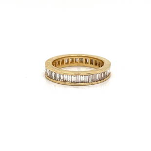 14k Diamond Baguette Eternity Ring: 14k Yellow Gold Weight 4g Diamond Baguette Approx. 2ct Eternity Ring Size 6.5 Measurements 0.15”x0.84”