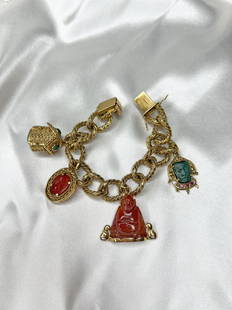 18k Victorian Bracelet and Charms: 18k Yellow Gold Weight 126.13g Victorian Bracelet Measurements 8.5”x0.62” and Charms Carnelian Buddha, Malachite Charm 