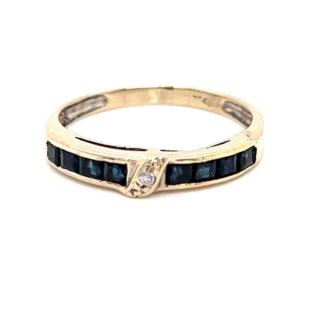 18k Sapphire Ring: 18k Yellow Gold Weight 1.5g Sapphire Ring Size 5.5 Measurements 0.18”x0.72”
