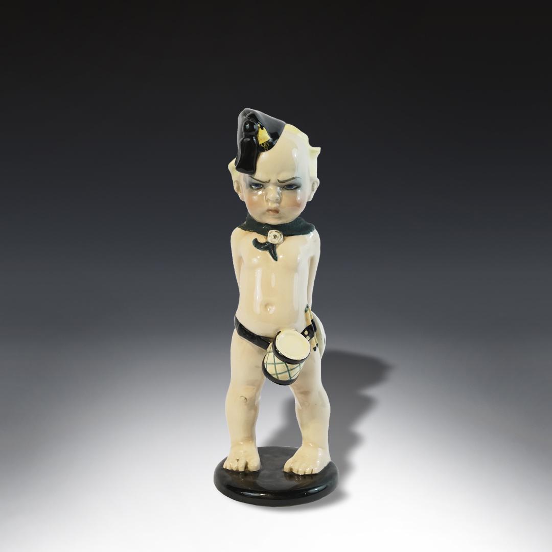 Italian early XX century porcelain: Italian early XX century porcelain figure of a fascist boy. Signed on the bottom lenci Measurement 14"x3"