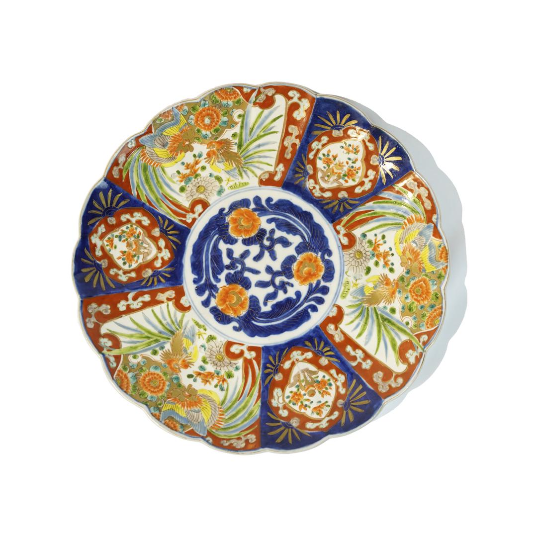 A big XIX century Imari bowl with flower scenes (1 of 2)