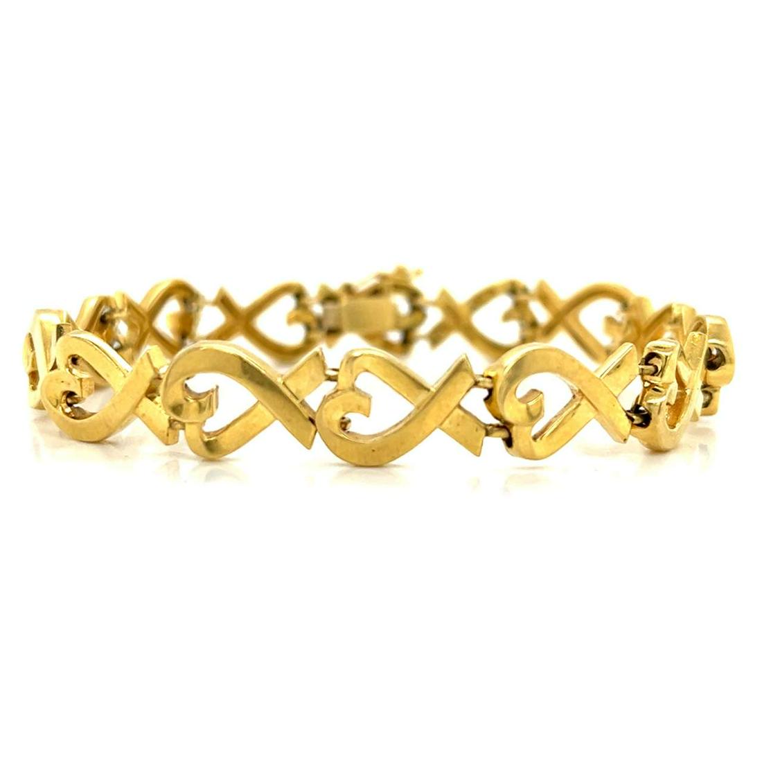 Tiffany & Co. 18K Yellow Gold Paloma Picasso Bracelet: Tiffany & Co. 18K Yellow Gold Paloma Picasso Bracelet Weighing 33.3 grams 7.25 inches in length