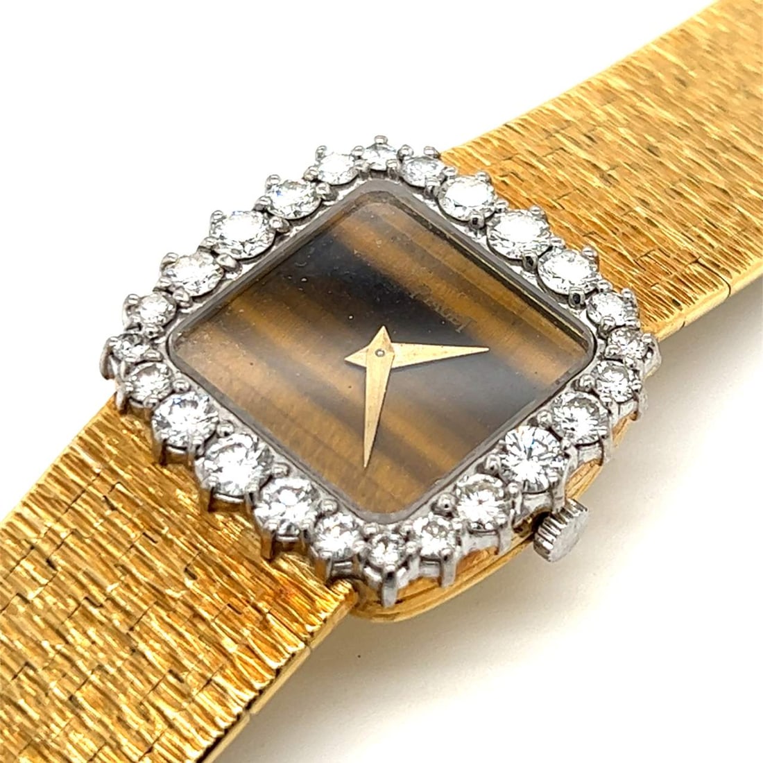 PIAGET 18K Yellow Gold Diamond Tiger-eye Watch: PIAGET 18K Yellow Gold Diamond Tiger-eye Watch Weighing 65.6 grams Set with 24 Diamonds weighing app. 2.50 Ct. F-G Color, VVS-VS Clarity Original Tiger-eye dial 7 inches in length