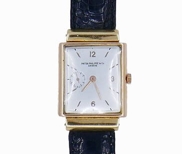Vintage Patek Philippe WRISTWATCH 18k Gold Estate Jewelry: This vintage watch is made of 18 karat yellow gold. The movement is mechanical, manual-wind, Swiss made. The movement, the case and the dial are made by Patek Philippe. This Patek vintage watch measur