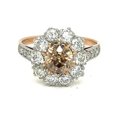 18k Diamond Rosette Ring: 18k Pink Gold & Platinum Weight 3.6gr Measurement 0.5”x0.74” Center Diamond Approx 0.95ct Vs1 Z Champagne Halo Approx 1.08ct TW 2.03ct Rosette Ring Size 6
