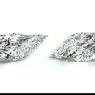 TIFFANY & CO. Platinum 4.70 Ct. GIA Certified 3-Stone Diamond Ring: TIFFANY & CO. Platinum 4.70 Ct. GIA Certified 3-Stone Diamond Ring Weighing 7.8 grams Set with: 2.20 Ct. GIA Certified Diamond F Color, VVS1 Clarity 1.26 Ct. GIA Certified Diamond E Color, VVS2 Clarit