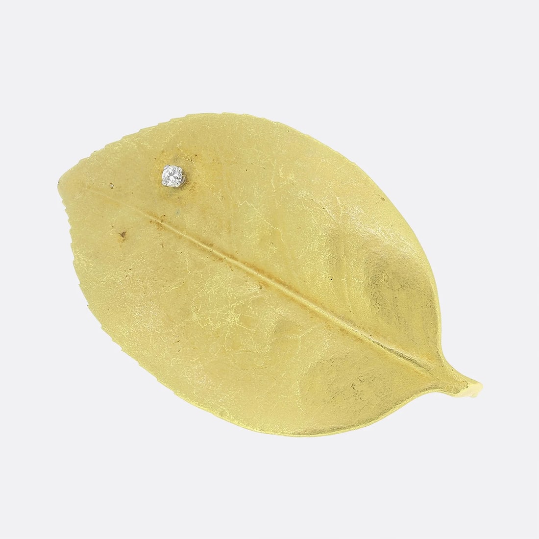 18k Andrew Grima 1970s Diamond Leaf Brooch: Weight:Â 6.7 grams Dimensions:Â 54mm x 31mm Diamond:Â Approx. 0.05 carats, Colour: F, Clarity: VS Marked:Â GRIMA Hallmarked:Â AG ltd, London, 18ct, 19
