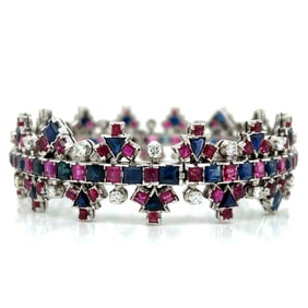 1960’s 18K White Gold Diamond, Sapphire, and Ruby Bangle Bracelet