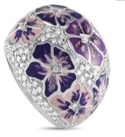 A delightful, wonderfully-cut citrine stone takes the central spot of this enchanting pin from