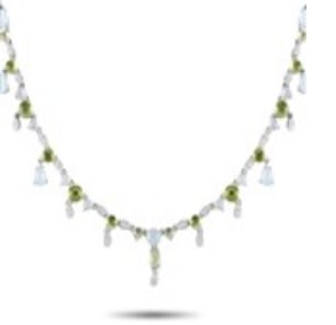 This Bucherer creation can do many things. It can accentuate your collarbone, draw attention to your: Bucherer 18K White Gold 0.55ct Diamond, Aquamarine and Peridot Necklace BU15-071224