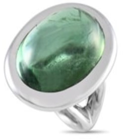 An eye-catching 25.69 carat tourmaline gemstone makes a statement at the center of this impressive