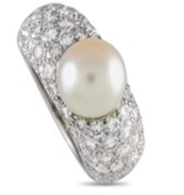 Sweep her off her feet with this gorgeous diamond and pearl Juliette ring from Cartier. It features