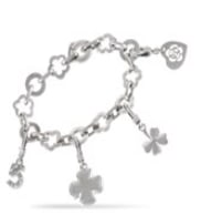 The Chanel charm bracelet is a dream. The bracelet is made up of alternating floral and round links.