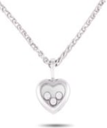 Complete a feminine look with this Chopard Happy Diamonds necklace. It features a heart-shaped white