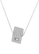 This pendant necklace is luxurious and glamorous. It is made of 18K white gold and boasts a
