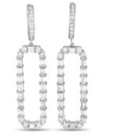 The perfect accompaniment to a special occasion outfit! These yellow gold ear sparklers feature a