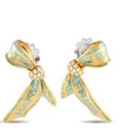 These Stefan Hafner possess a stunning sense of movement. Each one features an 18K Yellow Gold