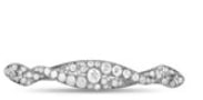 Add dimension to your jewelry collection with this antique brooch from Tiffany & Co. It has a simple