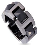 This Versace ring is made out of 18K white gold and black ceramic and weighs 10.1 grams. It boasts