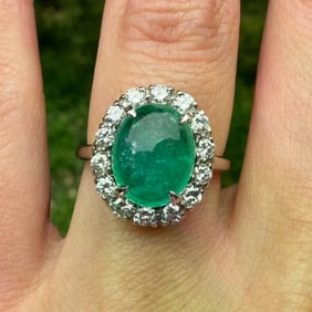 3.3 Carat Cabochon Emerald and Diamond Halo Ring