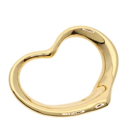 Tiffany heart pendant in 18K yellow gold for women. TIFFANY&Co.
