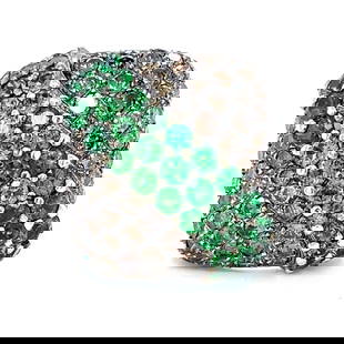 18K White Gold Garnet & Diamond Ring: 18K White Gold Garnet & Diamond Ring Weighing 26.3 grams Set with 64 Champagne Diamonds weighing app. 6.00 Ct. Along with 34 Green Garnets weighing app. 7.00 Ct. Ring Size 8.5