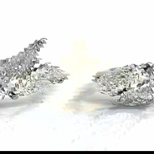 14K White Gold 1.80 Ct. Diamond Ring
: 14K White Gold 1.80 Ct. Diamond Ring&#226;&#8364;&#168;Weighing 2.8 grams Set with an app. 0.90 Ct. Pear-shaped Diamond in center&#226;&#8364;&#168;J Color, Si2 Clarity Along with 2 Diamonds weighing