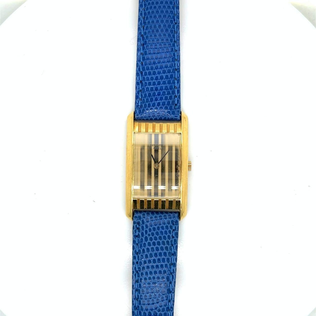 VAN CLEEF & ARPELS 18K Yellow Gold Watch: VAN CLEEF & ARPELS 18K Yellow Gold WatchWeighing 35.4 grams30 x 21.5mm CaseQuartz movementAftermarket Blue Lizard StrapOriginal VCA Buckle