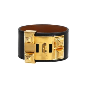 Hermes Hermès Collier de Chien Bangle in black box calf leather with an X stamp and gold hardware.
