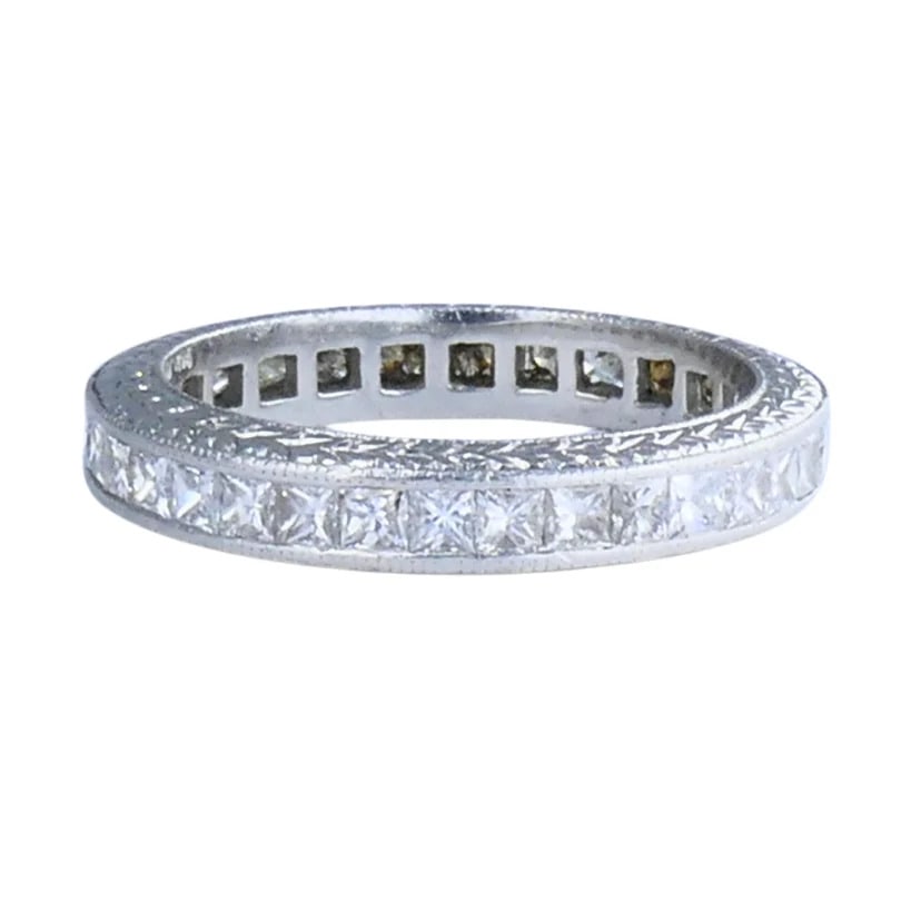 Michael Beaudry Princess Cut Diamond Eternity Band Platinum Size 6 Wedding Ring: Designer: Michael BeaudryCirca: 2000sMaterials: PlatinumGemstone: Diamond Princess Cut, 26, F-G/VS, 1.80 Carats TotalWeight: 5.3 GramsMeasurements: Width 3.6 mmRing Size: 6, non-sizableHallmarks: Beau