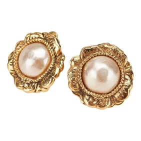 Chanel Coco Mark flower motif earrings, gold plated with faux pearls, for women.