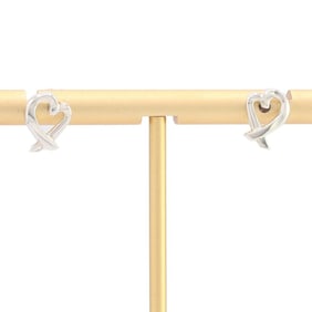 Tiffany & Co. Paloma Picasso Loving Heart earrings in sterling silver (925) for women.
