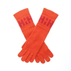 Hermes cashmere gloves for women in orange.