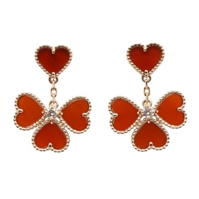 Van Cleef & Arpels Sweet Alhambra Heart Earrings in 18K Pink Gold with Diamonds and Carnelian.