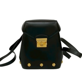 Salvatore Ferragamo pumps with logo hardware and calf leather backpack in black, 38824