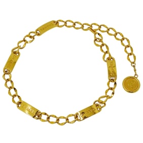 Chanel women's chain belt in gold with a coin motif and Coco Mark logo.