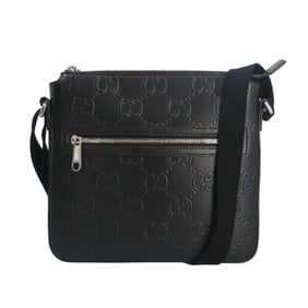Gucci GG embossed shoulder bag in leather (406410) for men.