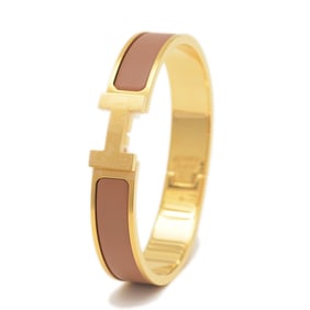 Hermes Hermès Click HH Clack PM Bangle in Brown and Gold Metal