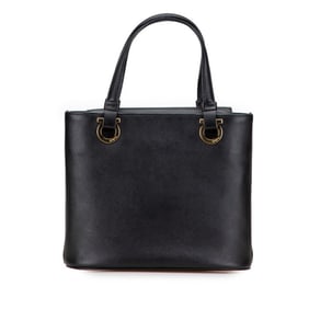 Salvatore Ferragamo Gancini handbag in black and gold leather for women.