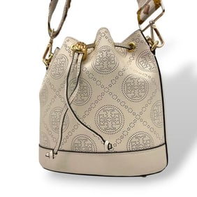 Tory Burch McGraw shoulder bag in ivory with perforated drawstring, beige leather, and gold